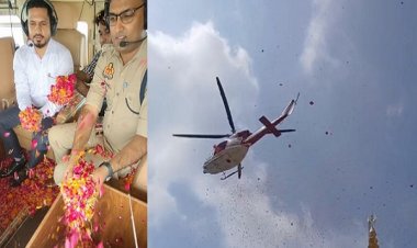 कांवड़ियों पर हेलीकॉप्टर से पुष्पवर्षा, डीएम-एसपी ने बरसाए फूल