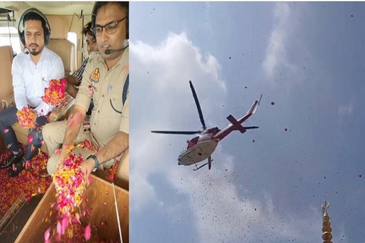 कांवड़ियों पर हेलीकॉप्टर से पुष्पवर्षा, डीएम-एसपी ने बरसाए फूल